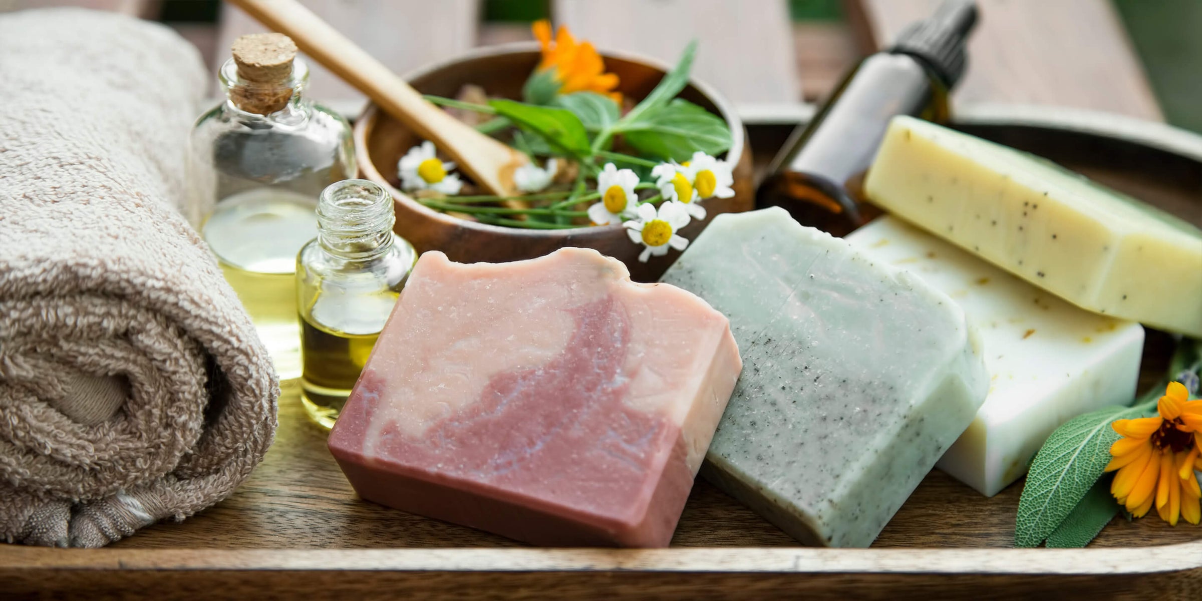 Towel, Soap bars, oils and herbs